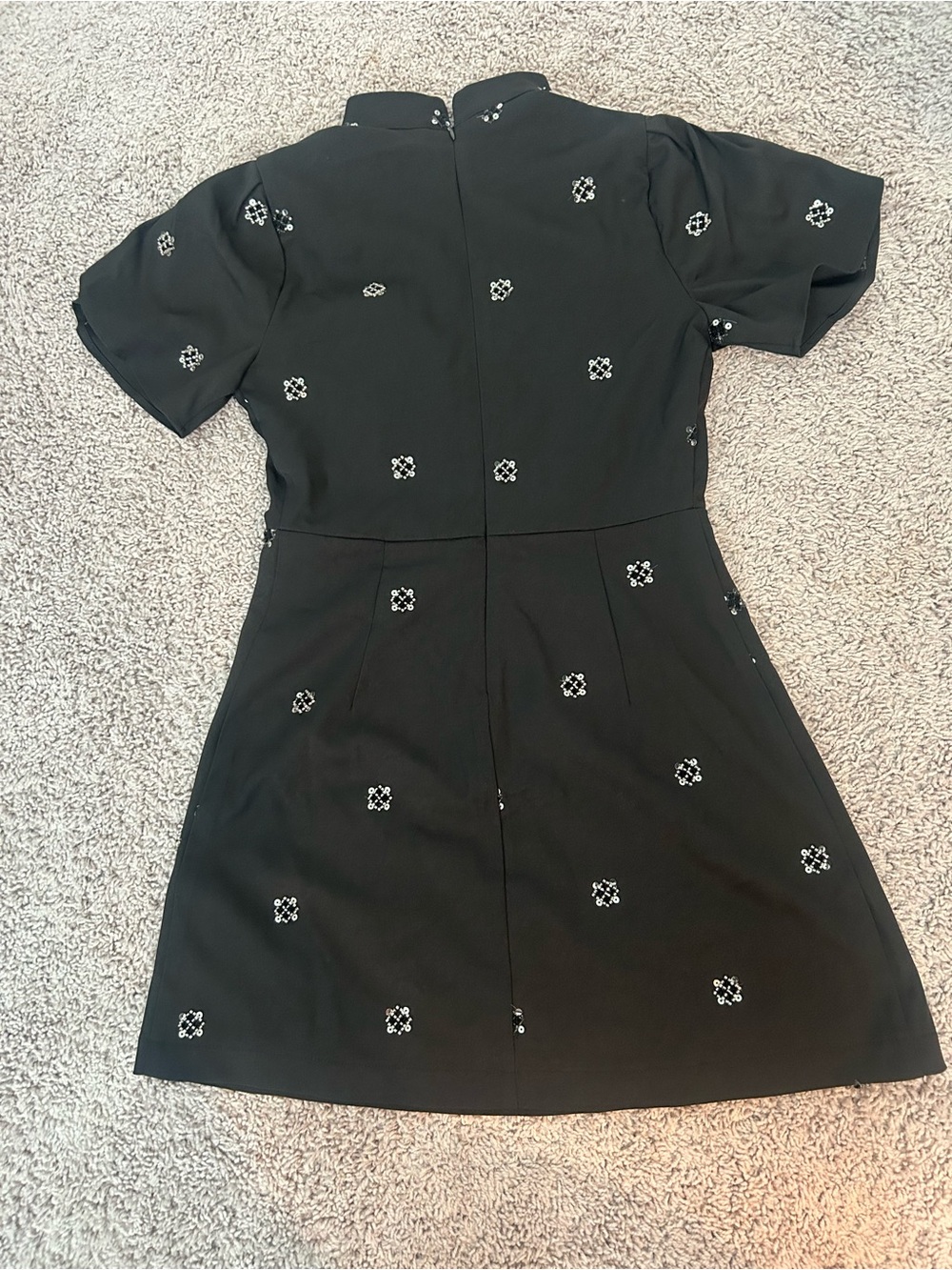 Black Mini Dress with White Embroidered Motifs